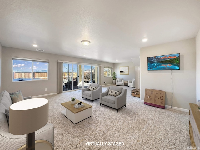 living room with light colored carpet