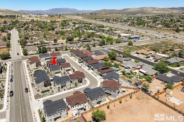 bird's eye view with a mountain view