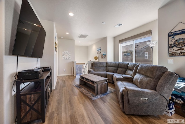 living room with hardwood / wood-style flooring