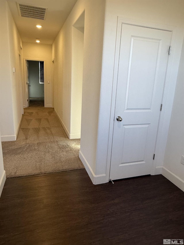 hall featuring dark hardwood / wood-style flooring