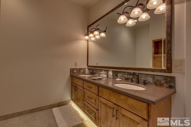 bathroom with vanity and tile patterned flooring