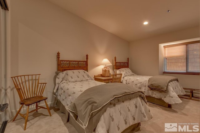 carpeted bedroom with vaulted ceiling