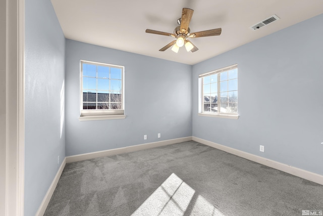 unfurnished room featuring carpet floors and ceiling fan