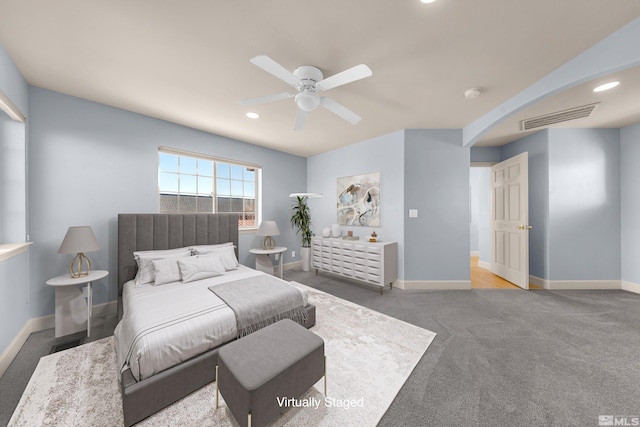 carpeted bedroom with ceiling fan