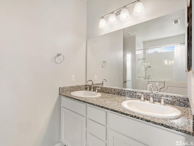 bathroom featuring vanity and a shower with curtain