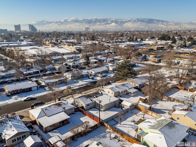 birds eye view of property featuring a mountain view