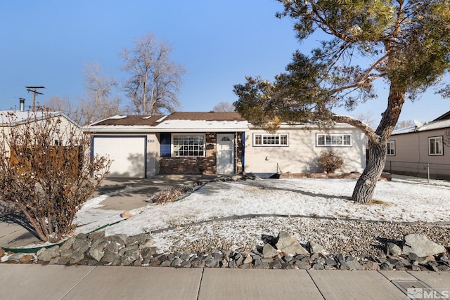 ranch-style home with a garage