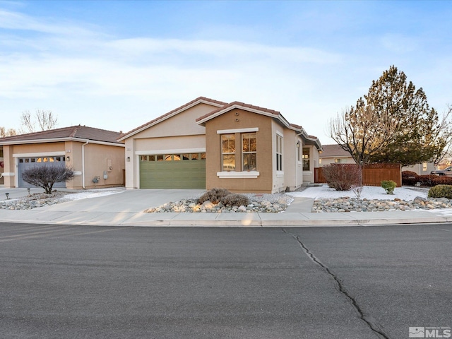 ranch-style house featuring a garage