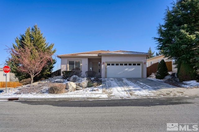 view of front of home featuring a garage