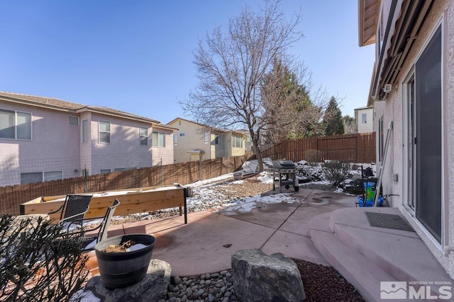 view of snow covered patio