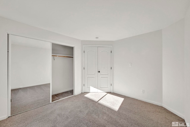 unfurnished bedroom featuring carpet floors