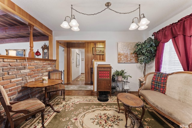 living area with parquet floors and a notable chandelier