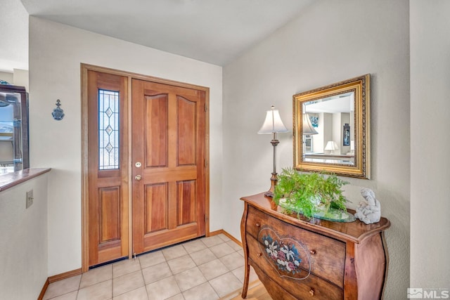 entrance foyer featuring light tile patterned floors