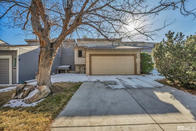 view of front of property with a garage