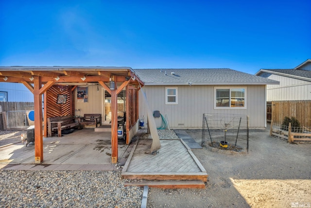 rear view of property with a patio area