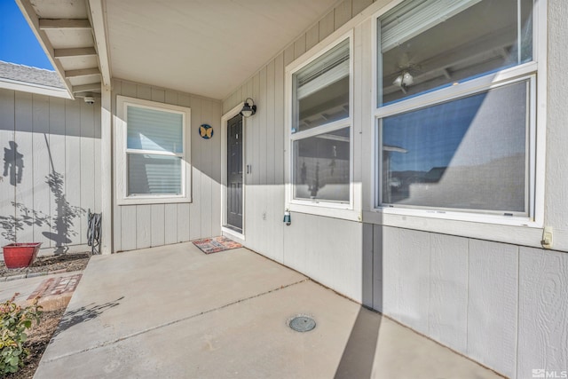 entrance to property featuring a patio