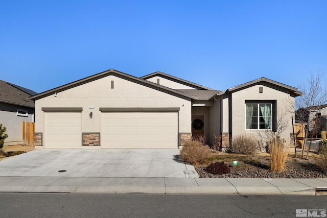 ranch-style home featuring a garage