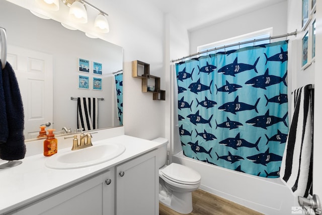 full bathroom with shower / bath combination with curtain, vanity, toilet, and wood-type flooring