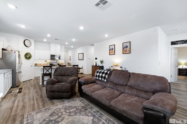 living room featuring light hardwood / wood-style floors