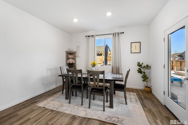 dining area featuring hardwood / wood-style floors