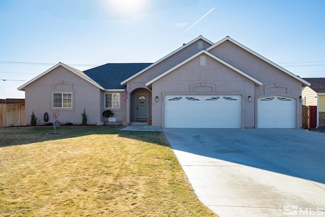 ranch-style home featuring a garage and a front yard