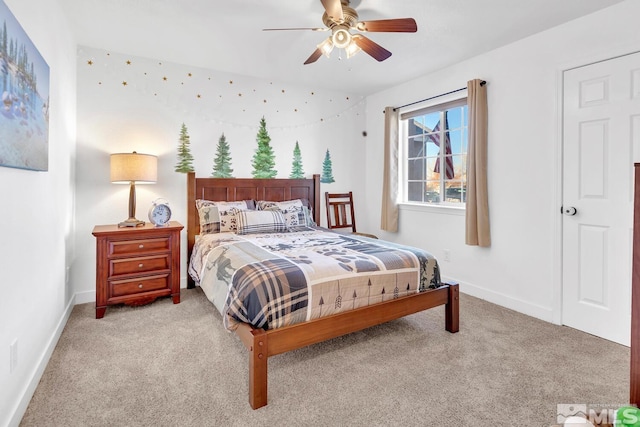 bedroom with ceiling fan and light colored carpet