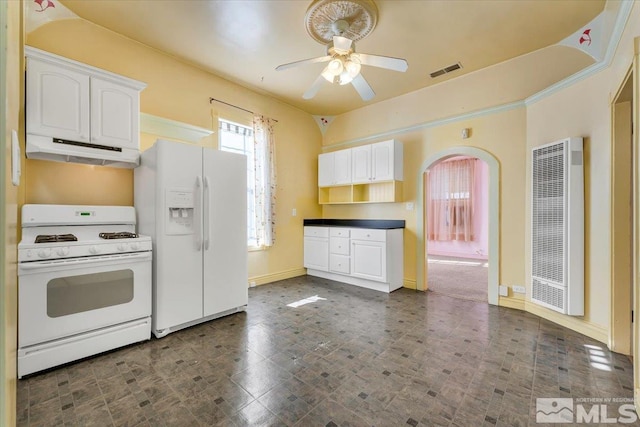 kitchen featuring white cabinetry, white appliances, and ceiling fan