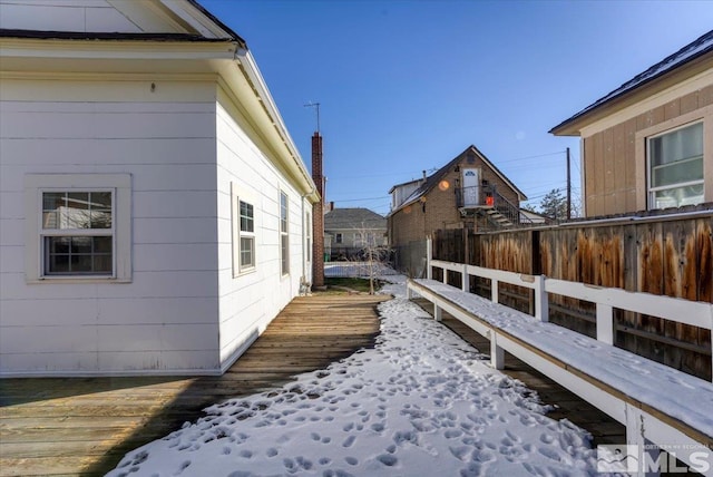 view of snow covered property