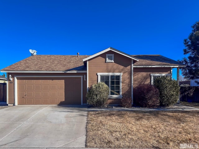 single story home featuring a garage