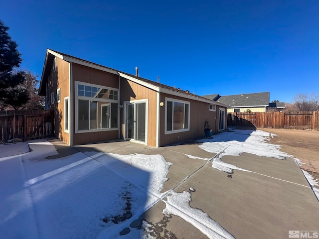 rear view of property with a patio