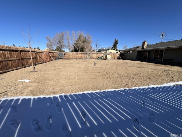 view of yard with a playground