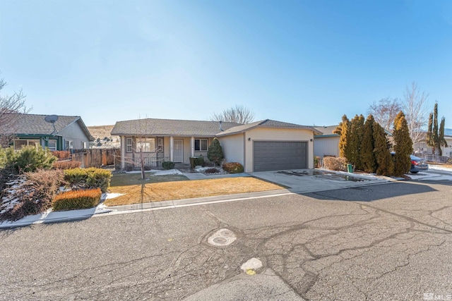 ranch-style home with a garage