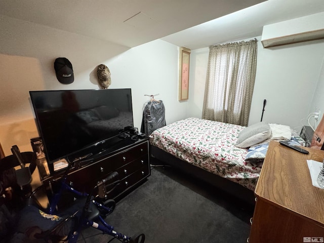 bedroom featuring carpet floors and a wall mounted AC