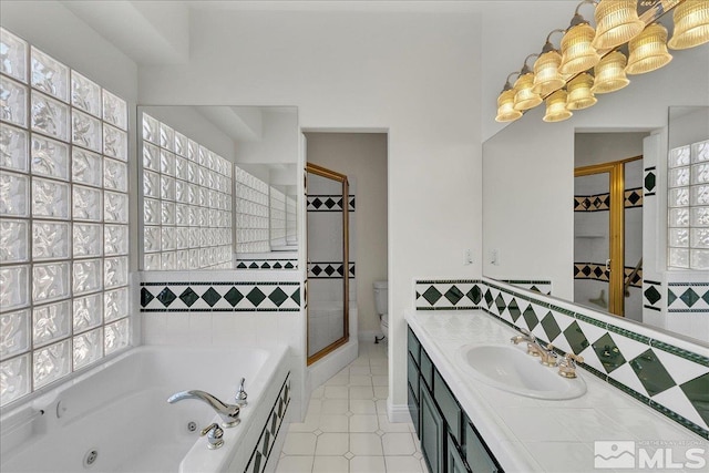 full bathroom with vanity, a chandelier, toilet, and separate shower and tub