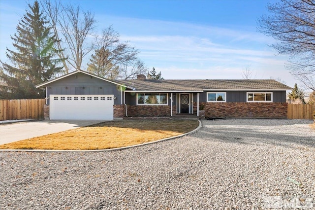 ranch-style house featuring a garage