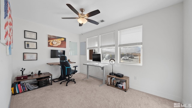 office area with ceiling fan and light colored carpet