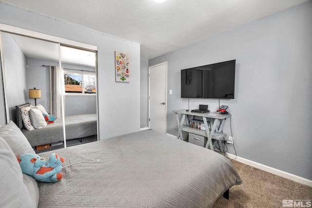 carpeted bedroom featuring a closet