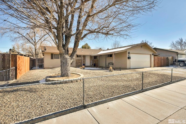 ranch-style home featuring a garage