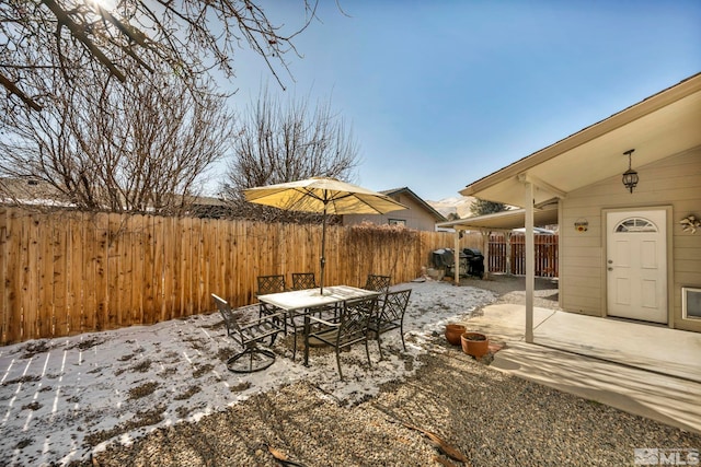 view of snow covered patio