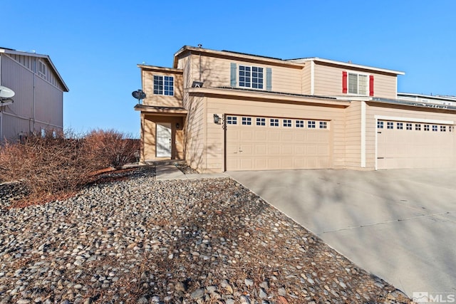 front of property with a garage