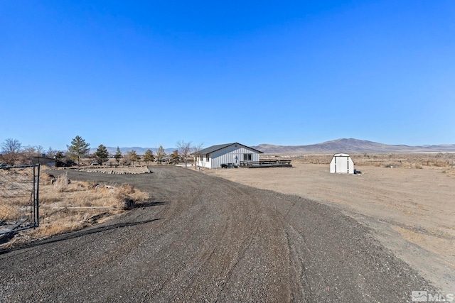 view of road featuring a mountain view and a rural view