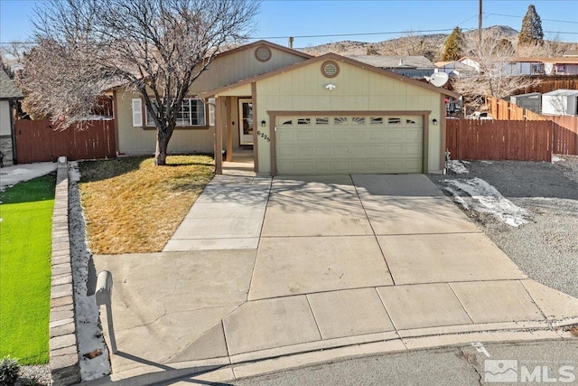 single story home featuring a garage