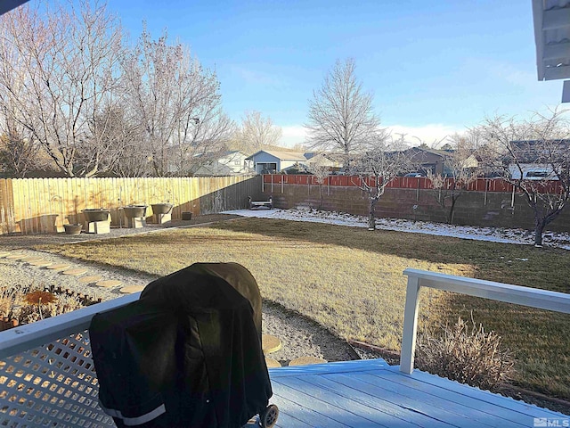 view of yard with a wooden deck