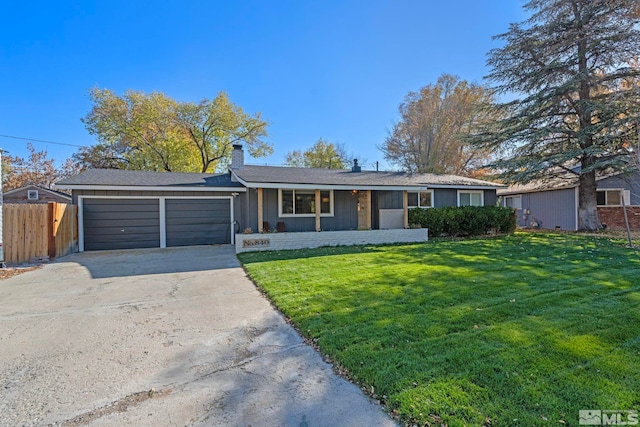 single story home featuring a garage and a front yard