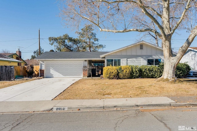 ranch-style house featuring a garage