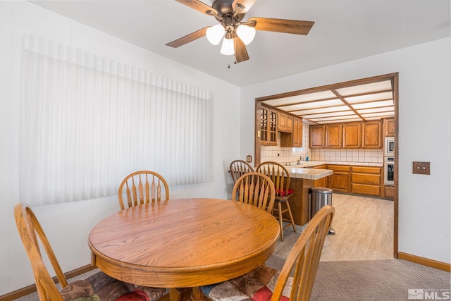 dining room with ceiling fan