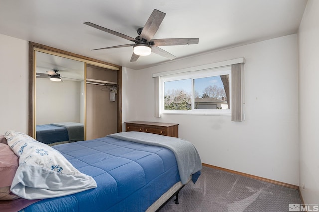 bedroom featuring ceiling fan, carpet, and a closet