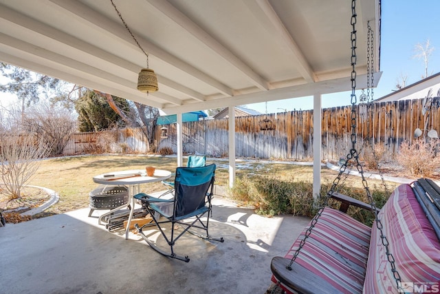 view of patio / terrace featuring a fire pit