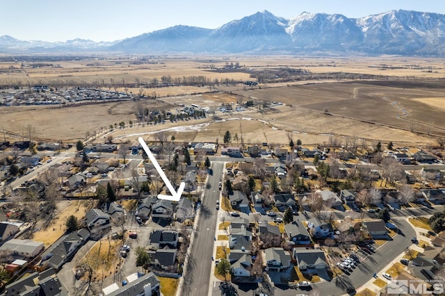 drone / aerial view featuring a mountain view