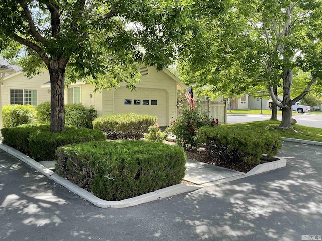 exterior space with a garage